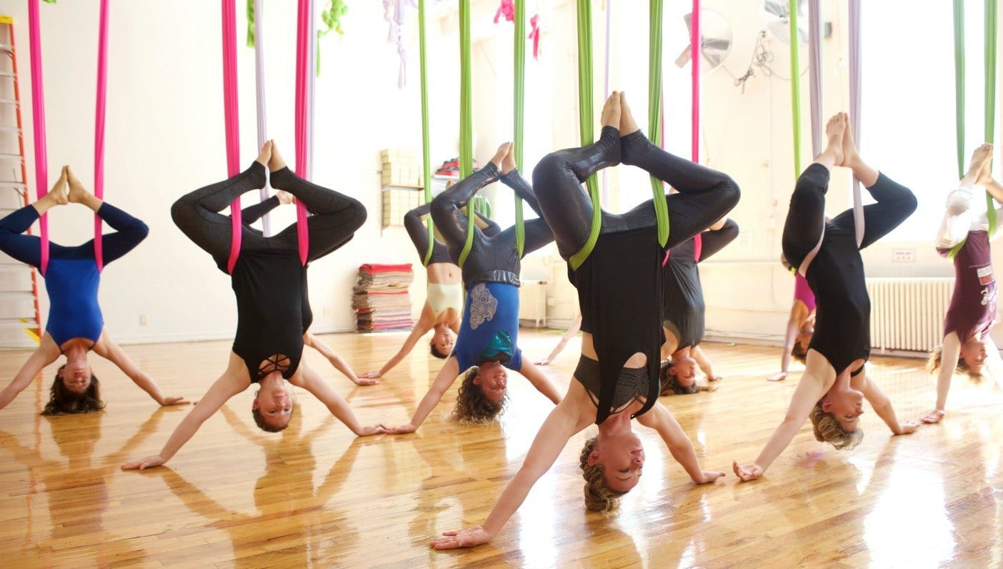 Yoga Pose: Hanging Sirsasana at 100th Monkey Yoga Studio