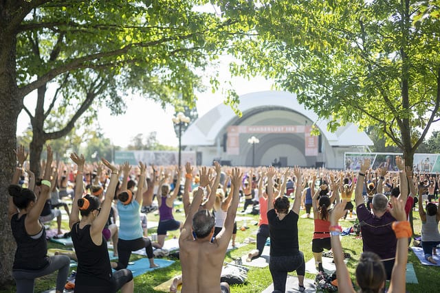 people practicing yoga at wanderlust 108 toronto