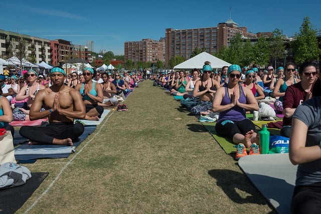 large group meditation in field