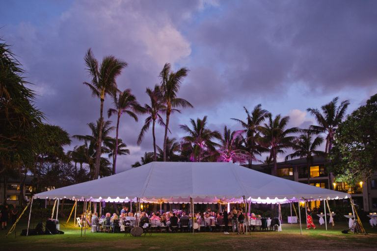 tent with dinner crowd at sunset