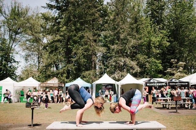 two women in crow pose