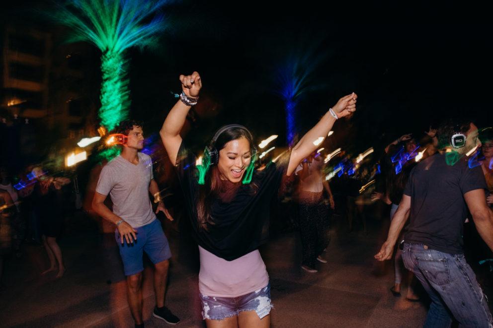 girl dancing with headphones